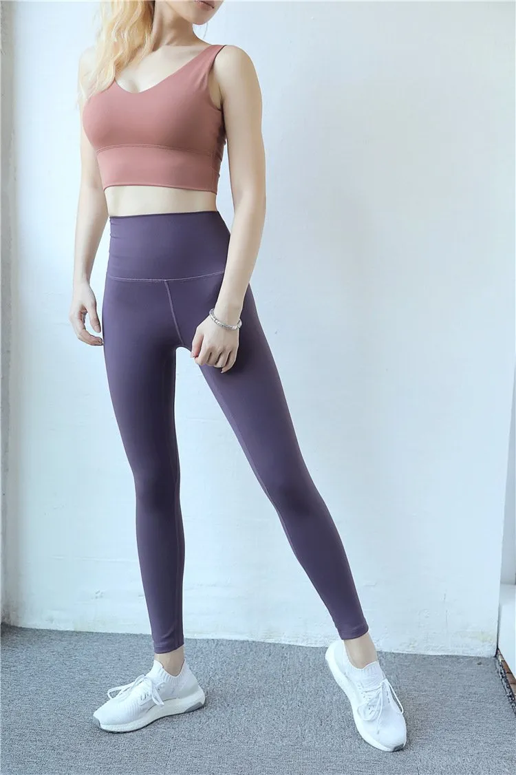 New European and American hip fitness pants Female high waist peach hip running tight feet sports yoga pants